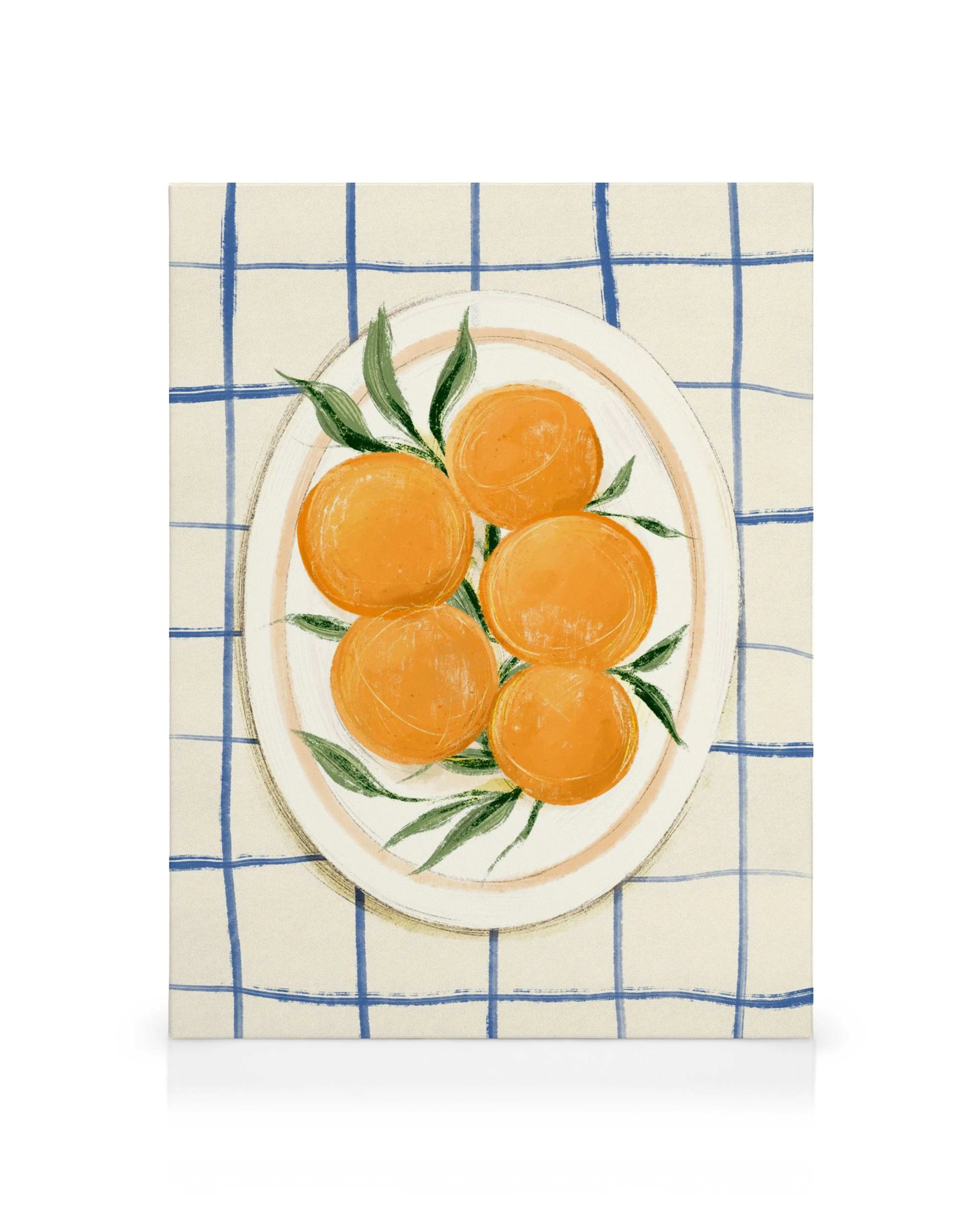 Tela decorativa com laranjas num prato oval sobre uma toalha de mesa xadrez em tons de creme e azul.