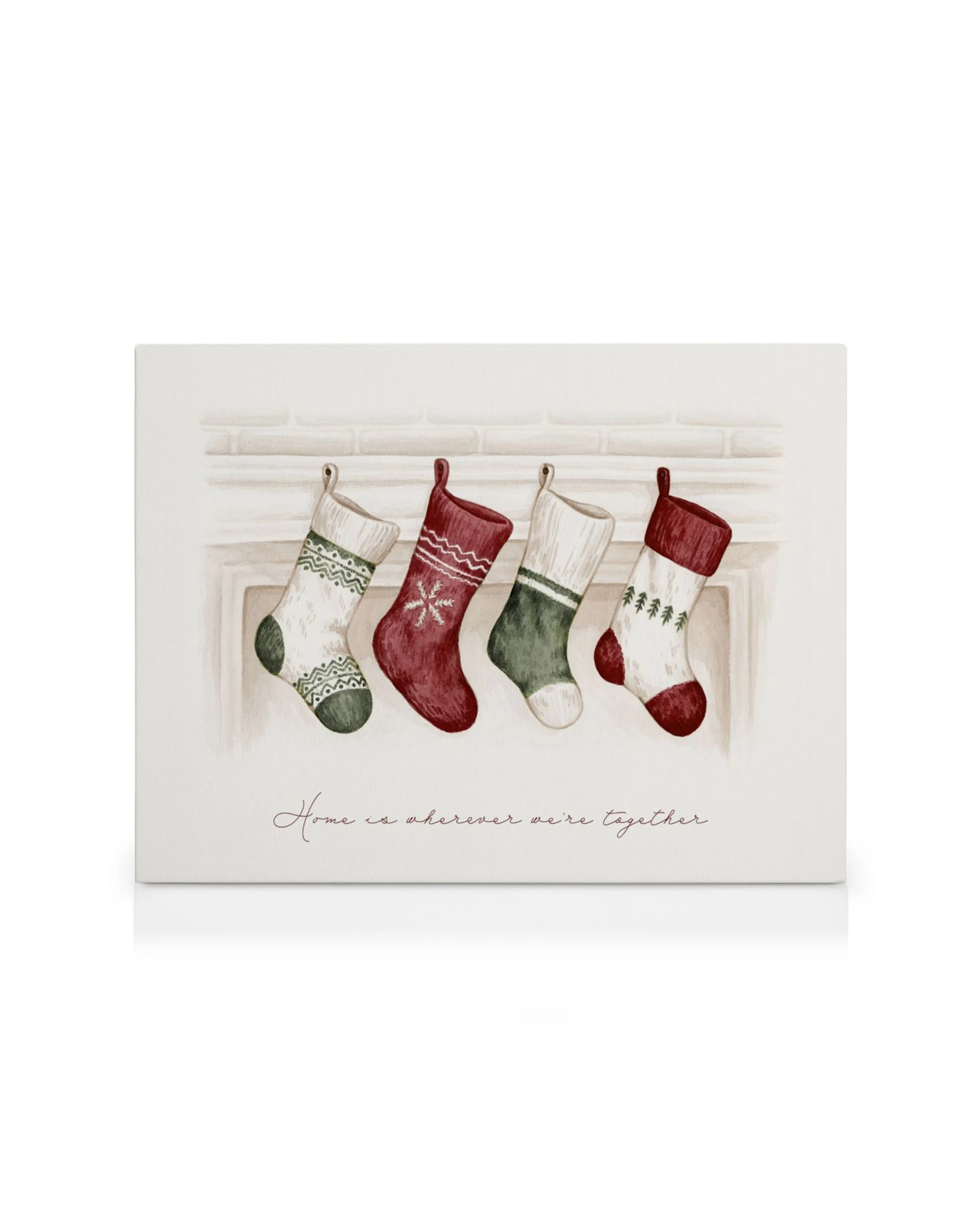 Toile de Noël avec quatre bas festifs suspendus et le texte Home is wherever were together en typographie rouge.