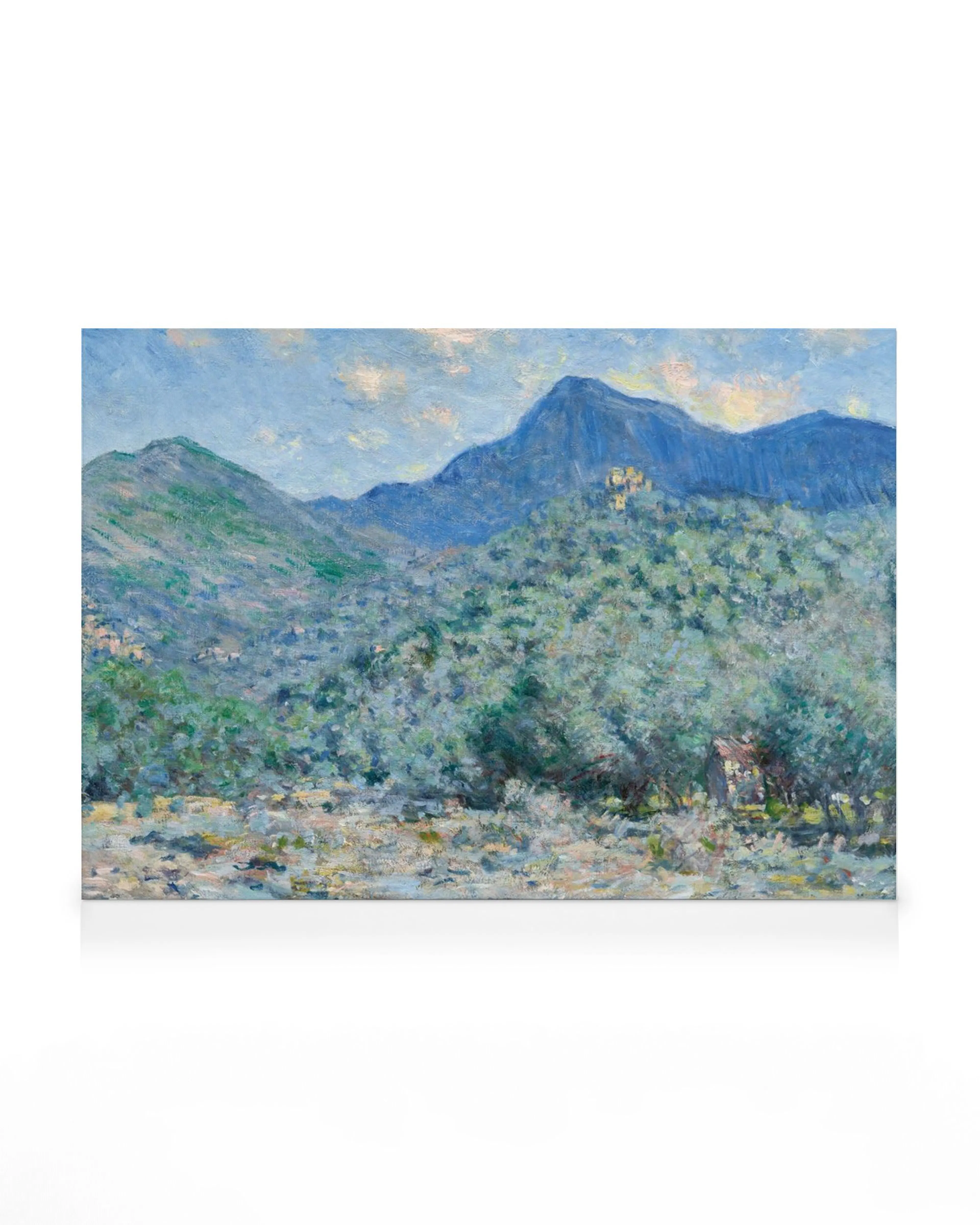 A canvas print of a vibrant Impressionist landscape painting, featuring lush green mountains, a blue sky, and a small building.