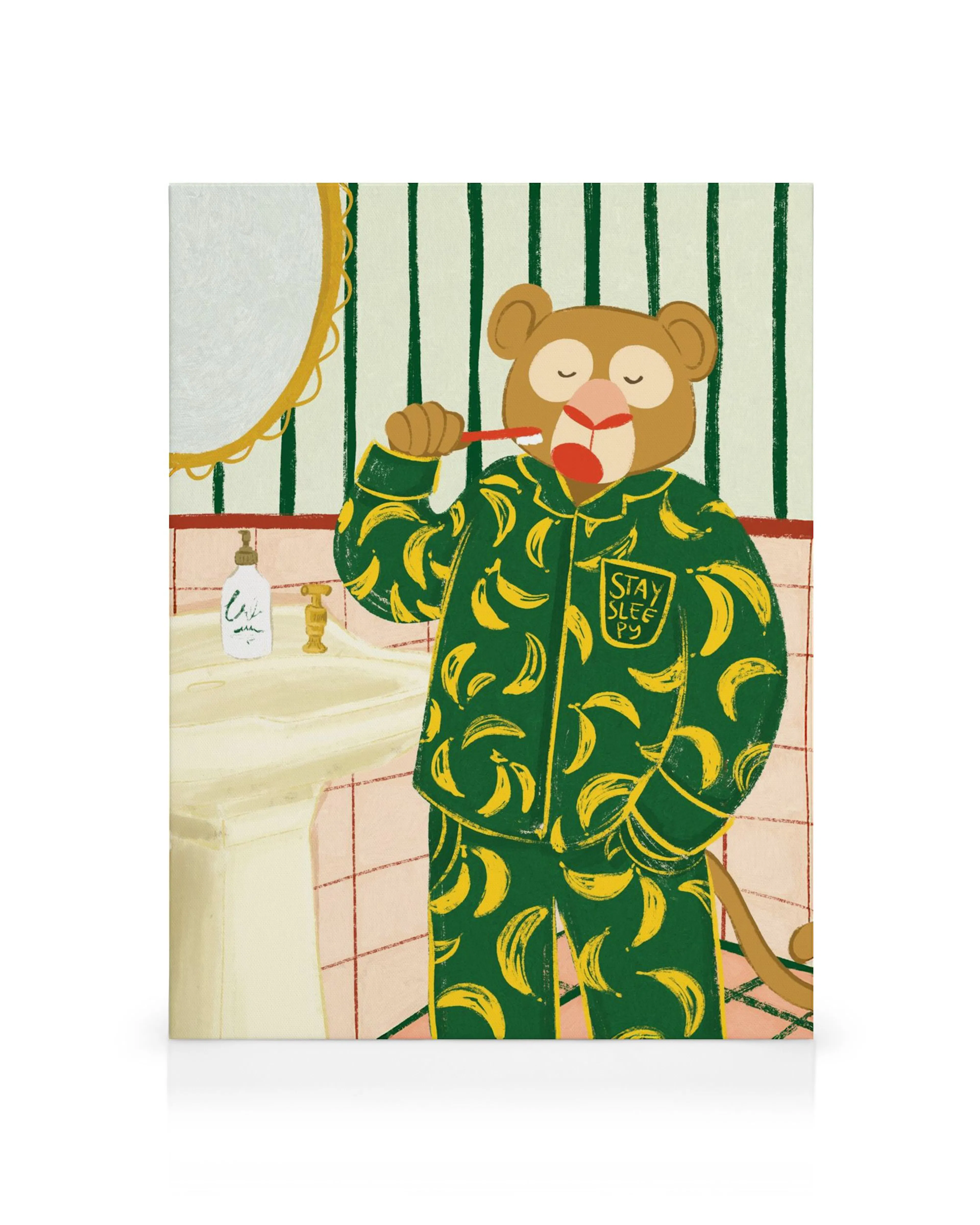 Tela decorativa de um macaco a lavar os dentes com pijama de bananas e a inscrição Stay Sleepy na casa de banho.