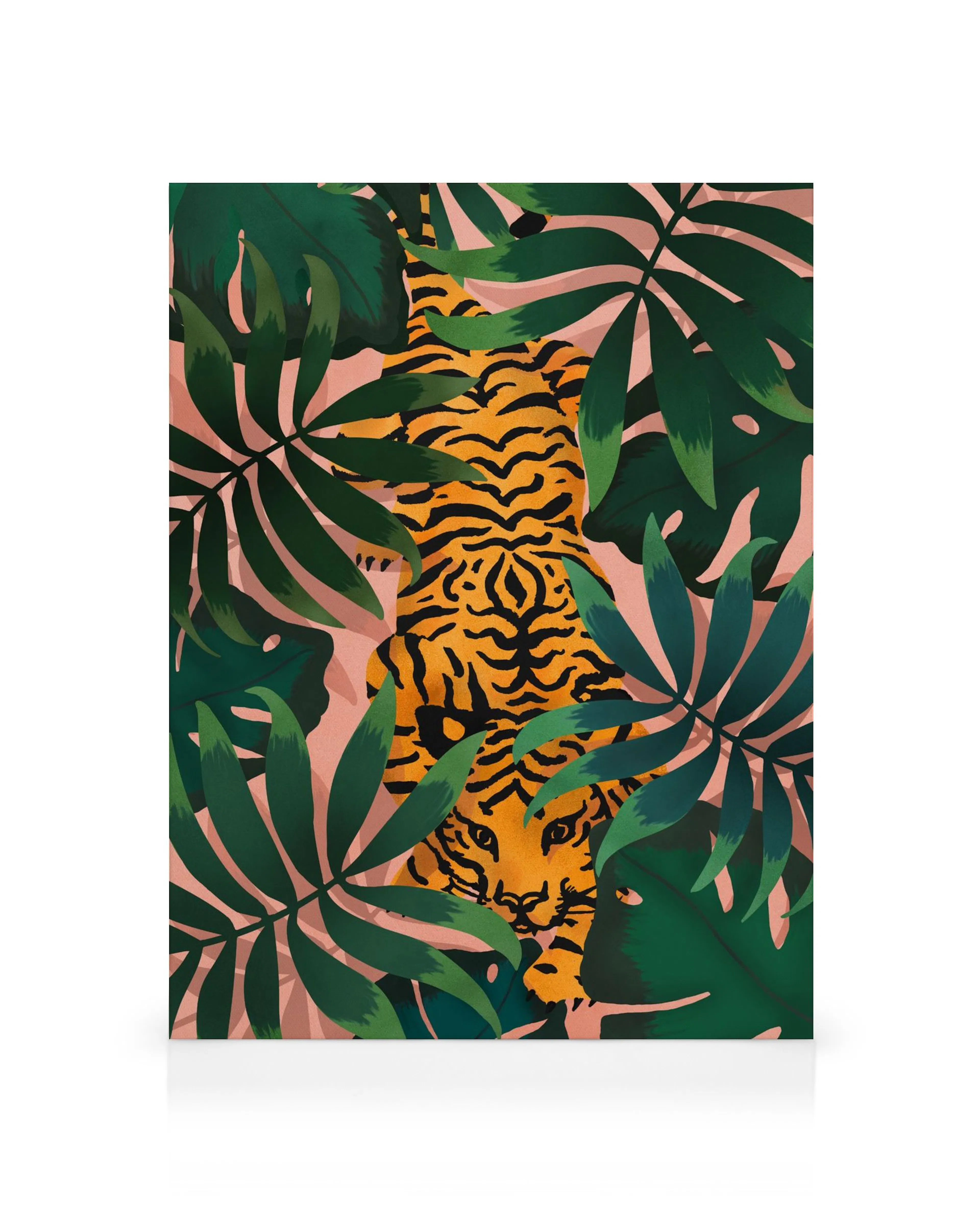 Vibrant canvas print of an orange tiger peeking through lush green jungle leaves on a pink background.