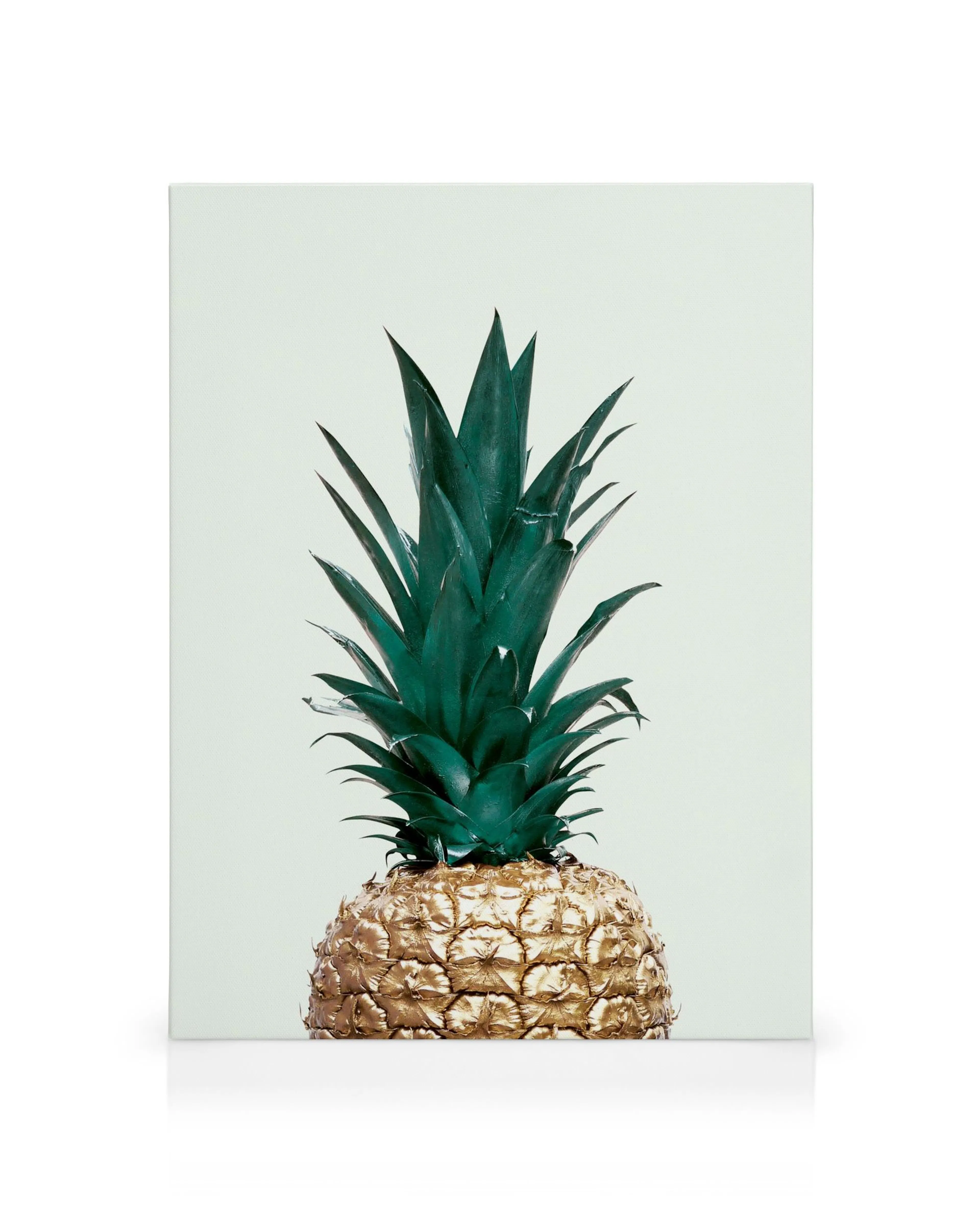 Green pineapple canvas print, gold painted base with green leaves on light background