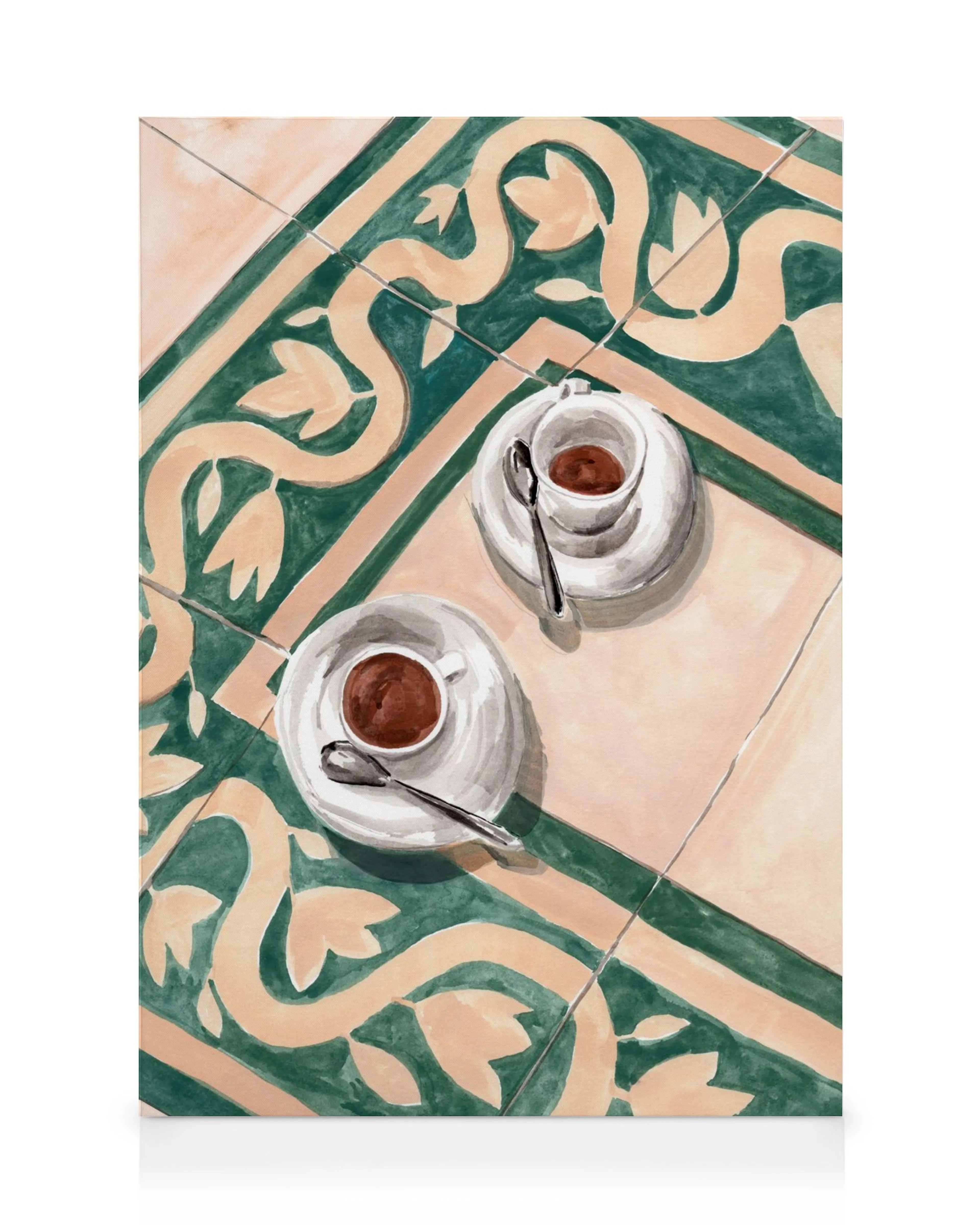 A canvas print of two white coffee cups with chocolate on a green and beige patterned tiled surface.