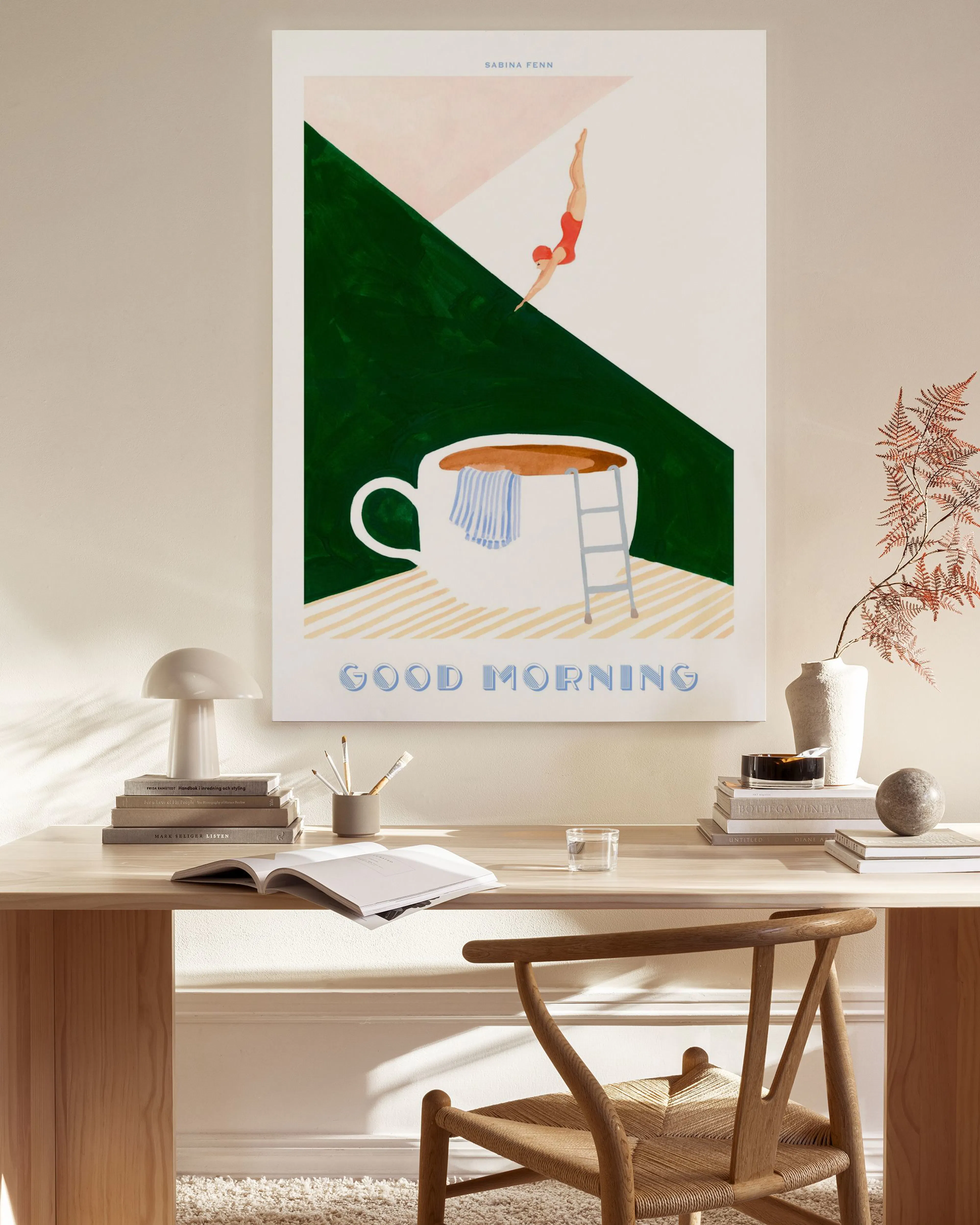 Leinwandbild: Frau in rotem Badeanzug springt in eine Kaffeetasse mit Leiter und Handtuch. Good Morning steht darunter.