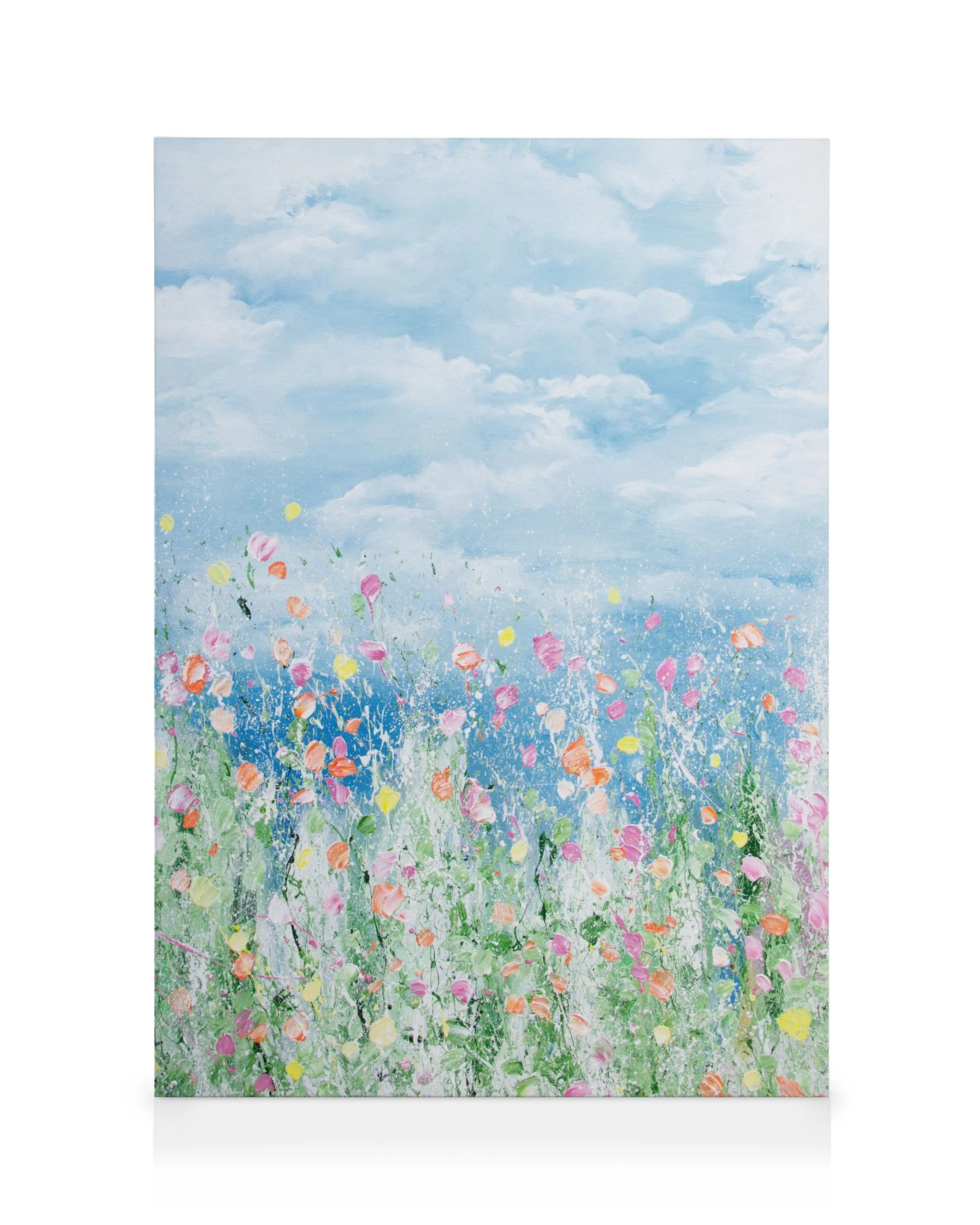 Fargerikt lerretsbilde av en blomstereng i rosa, oransje, gul og rød under en blå himmel med hvite skyer, gir en glad følelse.