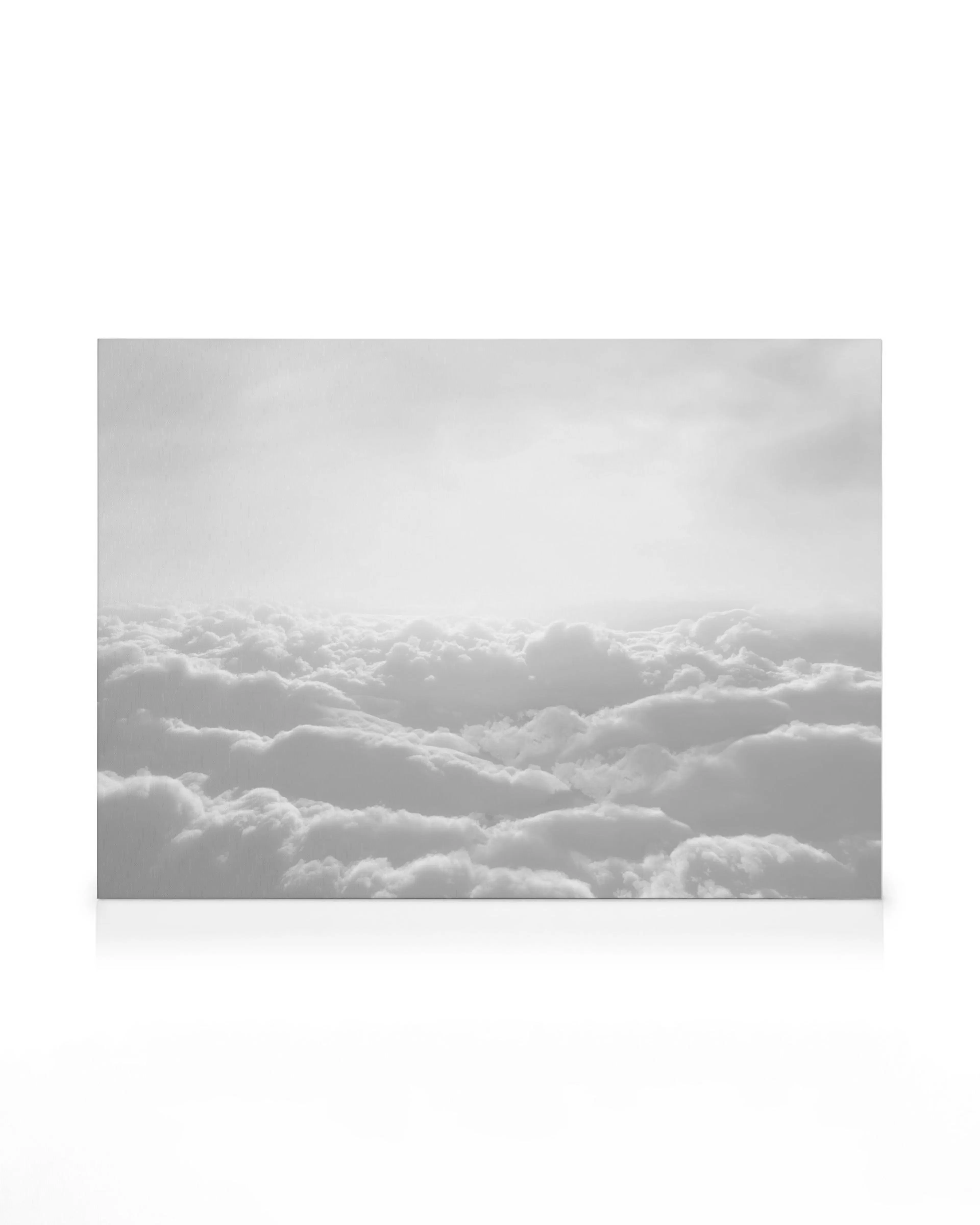 Heaven canvas print, black and white clouds with a reflective surface, serene cloudscape art.