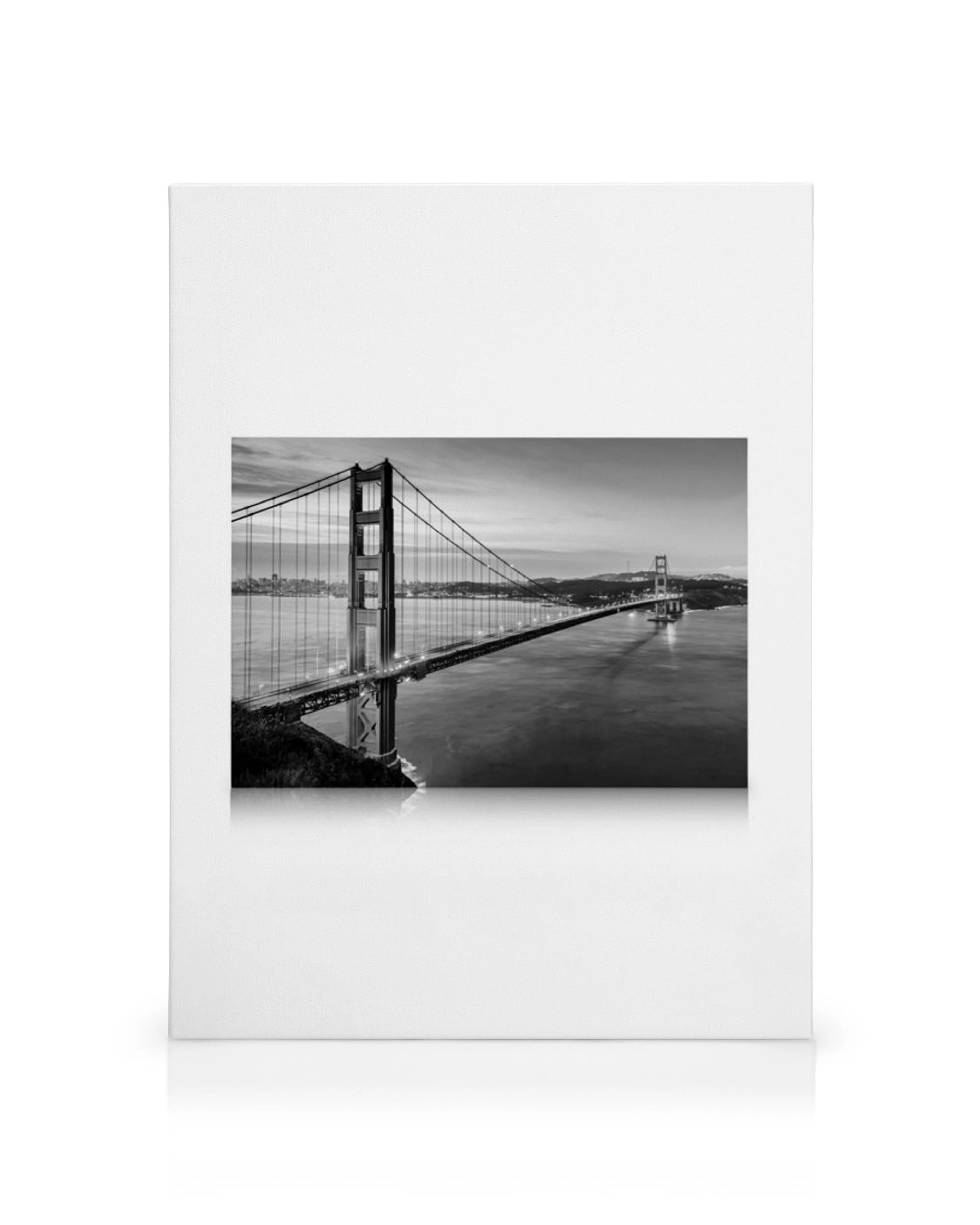 Golden Gate Bridge canvas print in black and white, featuring the iconic San Francisco landmark and bay at dusk.