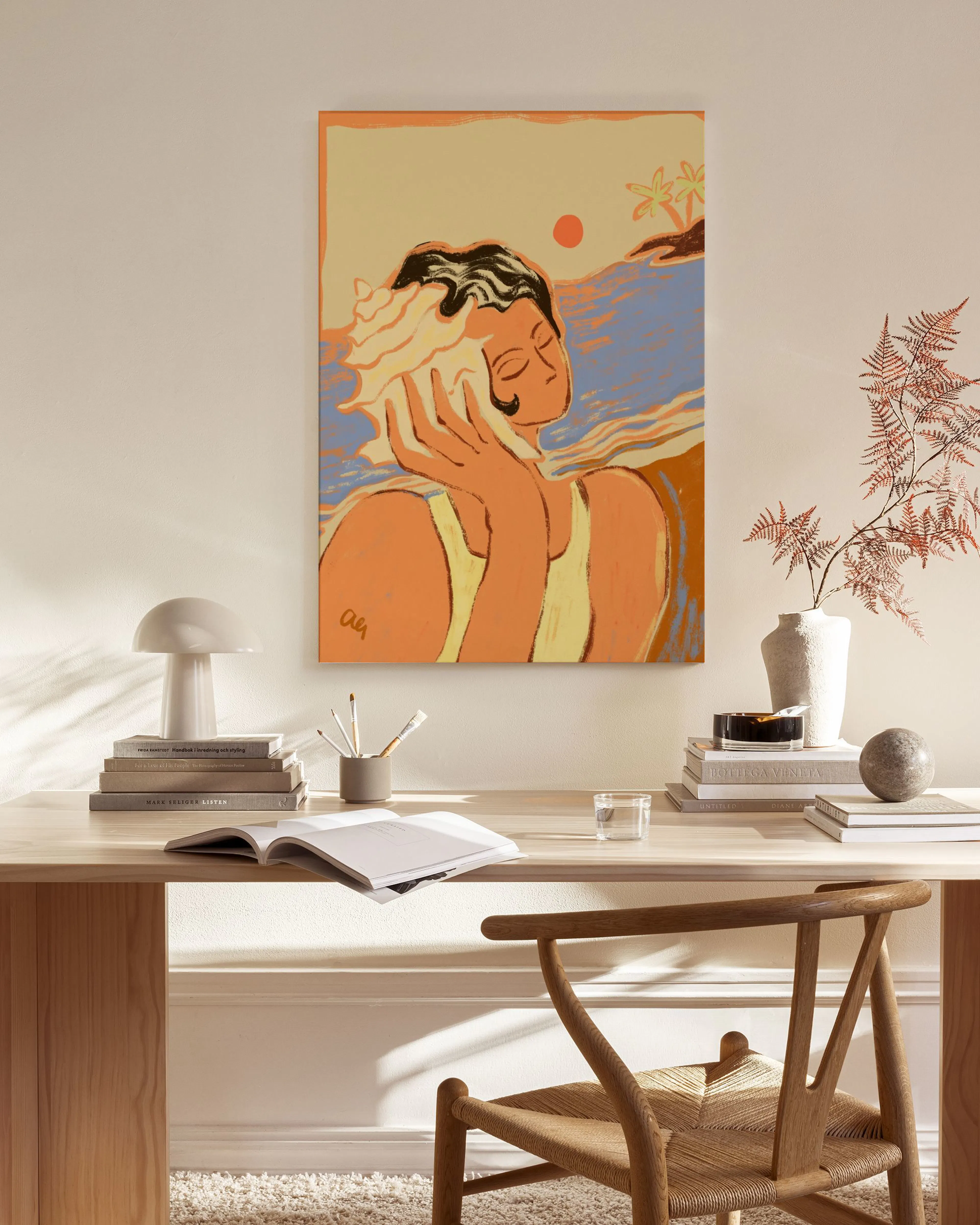 A colorful art print of a woman holding a seashell to her ear, hanging in a modern living room.