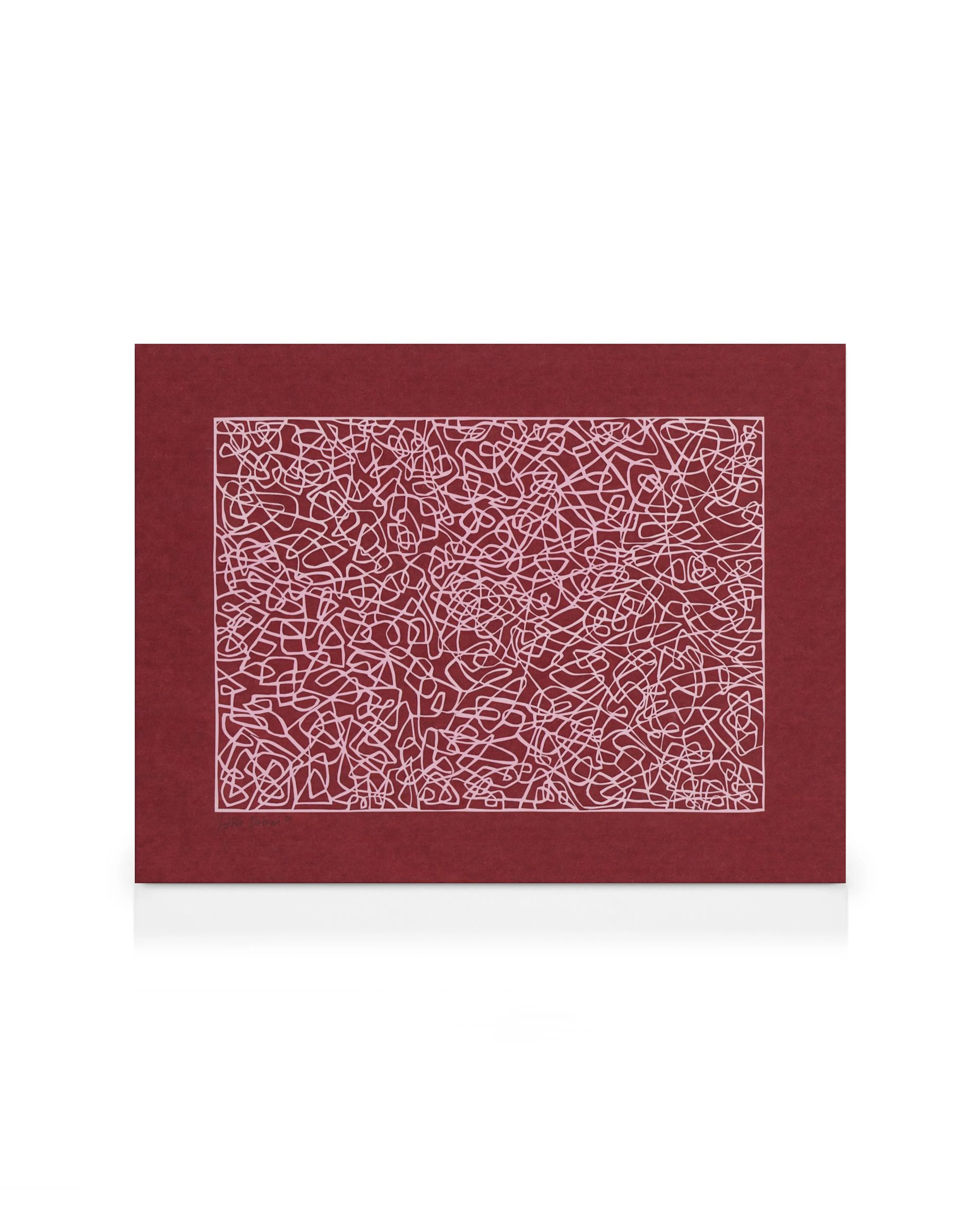 A canvas print features a dark red background with intricate light pink and white scribbled lines forming an abstract pattern.