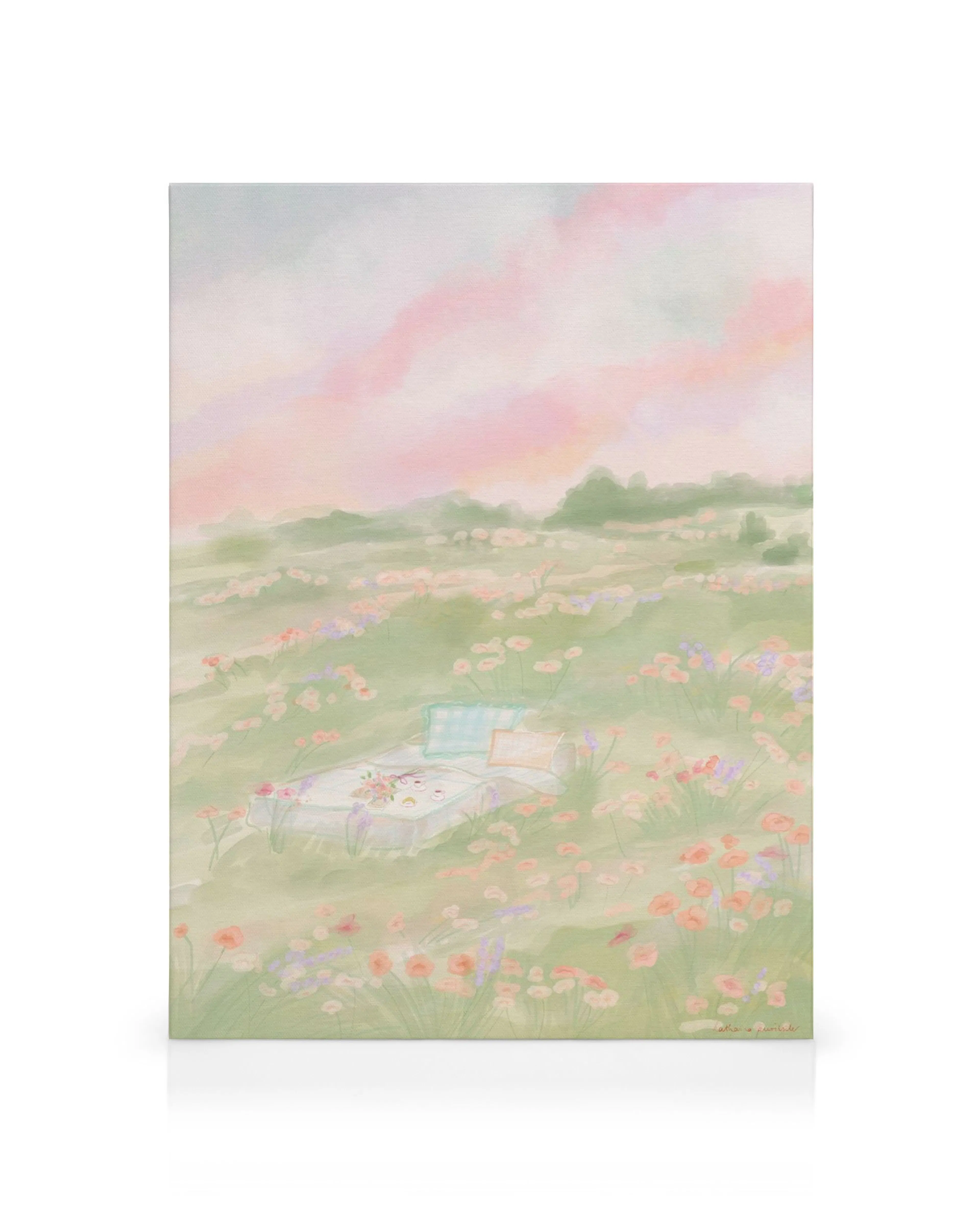 Lerretsbilde av et idyllisk piknikteppe i en blomstrende vår- eller sommereng med rosa himmel.