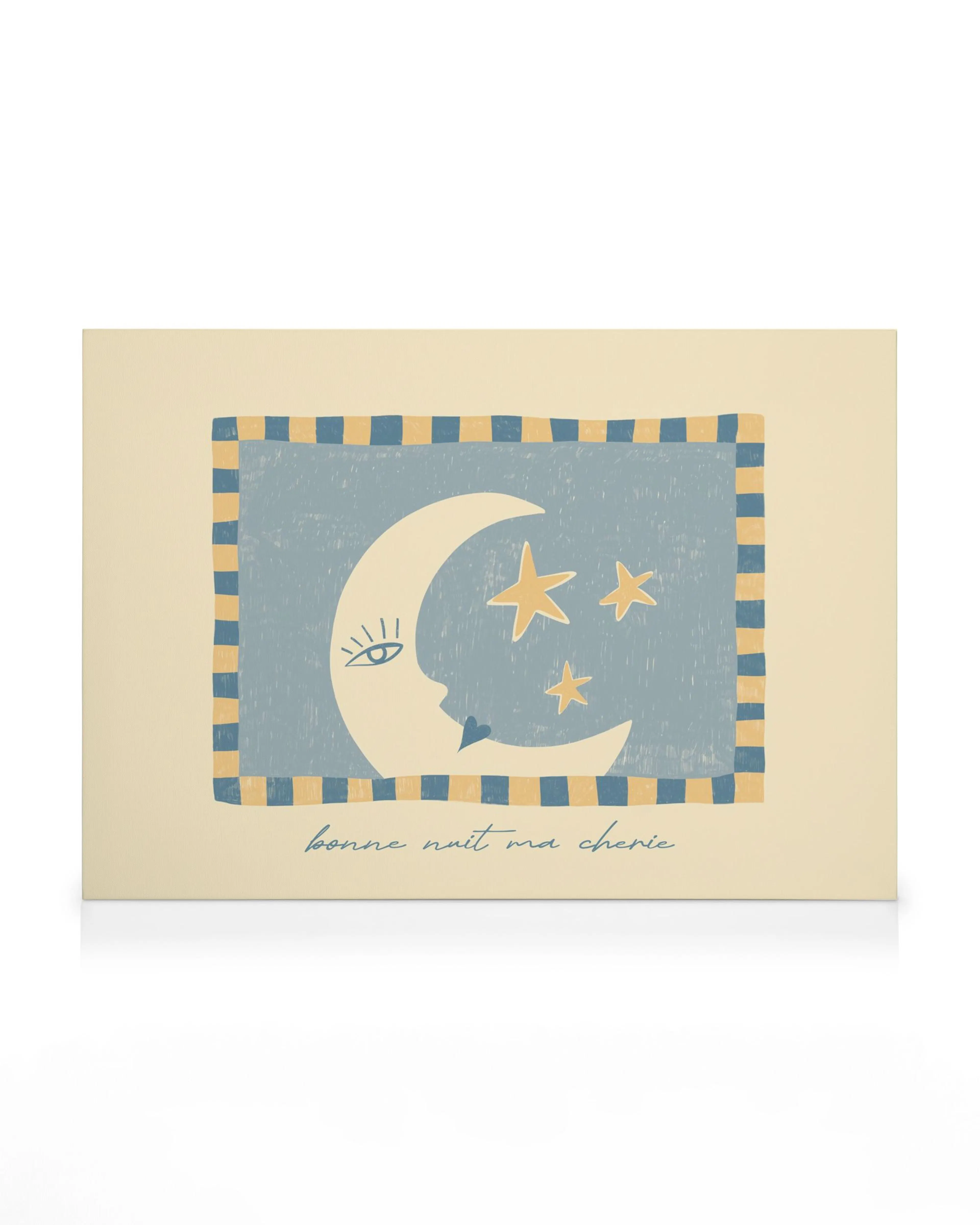 A canvas print featuring a crescent moon with a face and three stars on a light blue background bordered by yellow and blue chec
