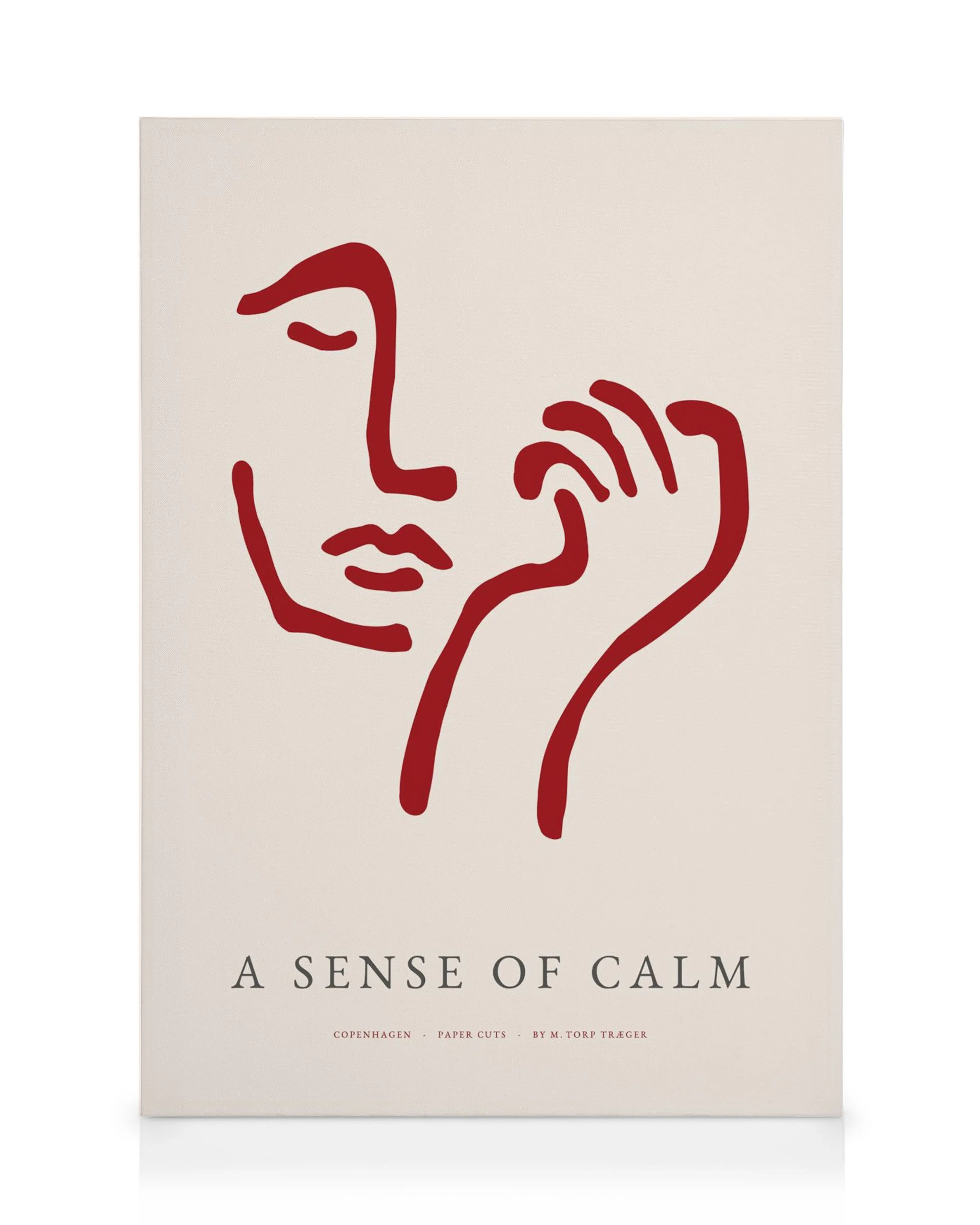 A canvas print featuring a red minimalist line art face with a hand, on a light cream background, with the text A SENSE OF CALM.